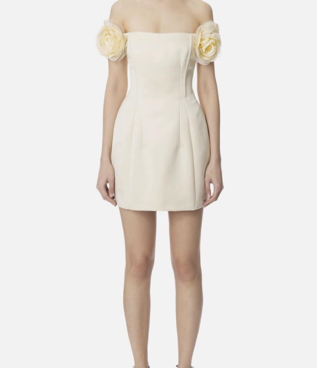 Dress in duchesse satin with applied flower