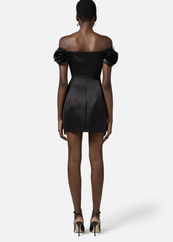 Dress in duchesse satin with applied flower