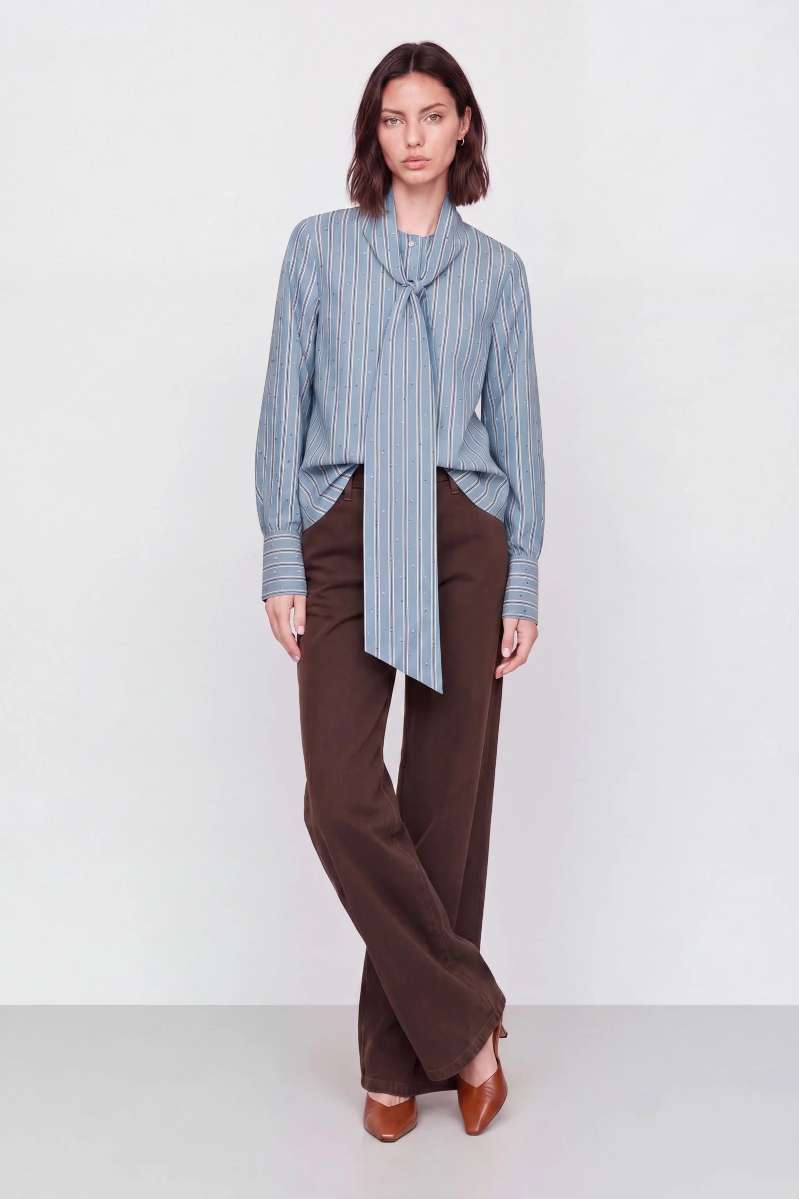 Blouse with a tie neck