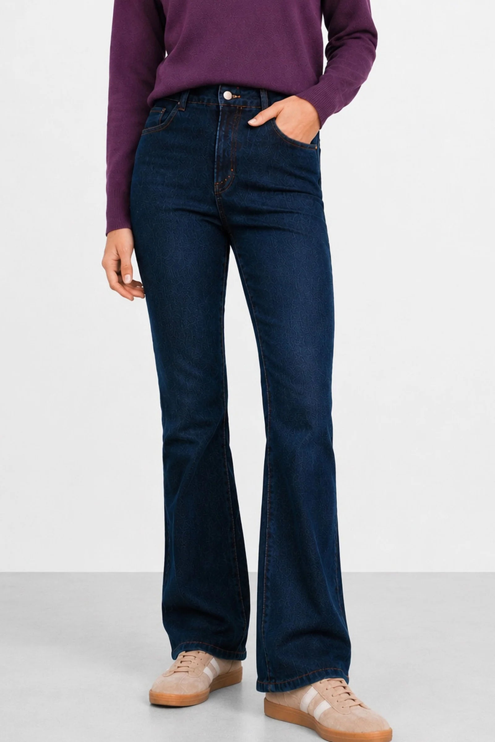 Flared jeans with decorative chains