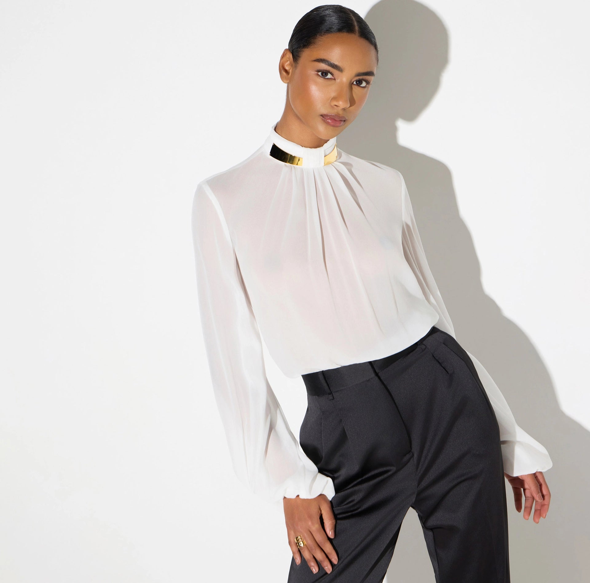 Bodysuit in georgette fabric with jewel collar