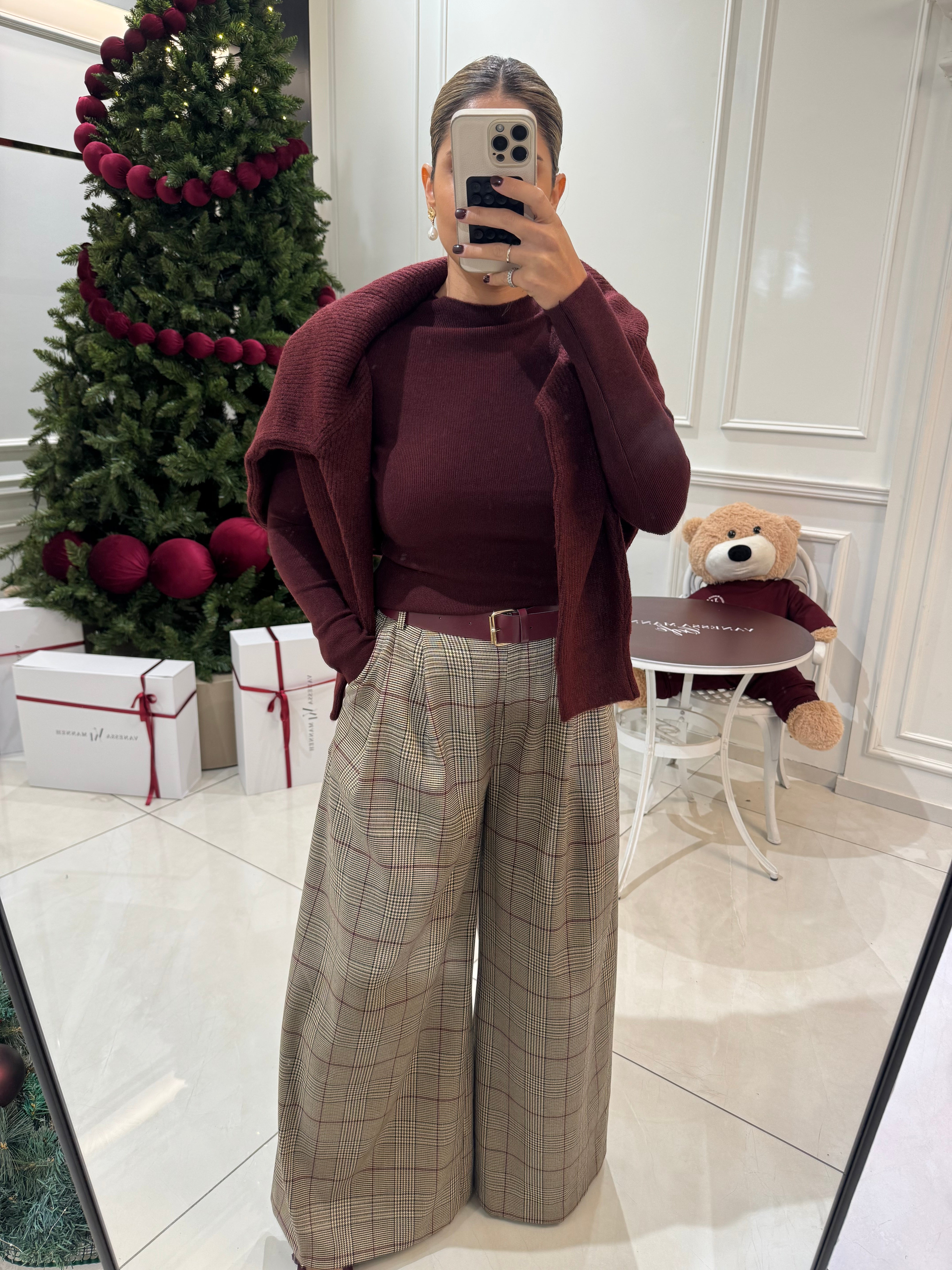 Plaid pants with a burgundy belt