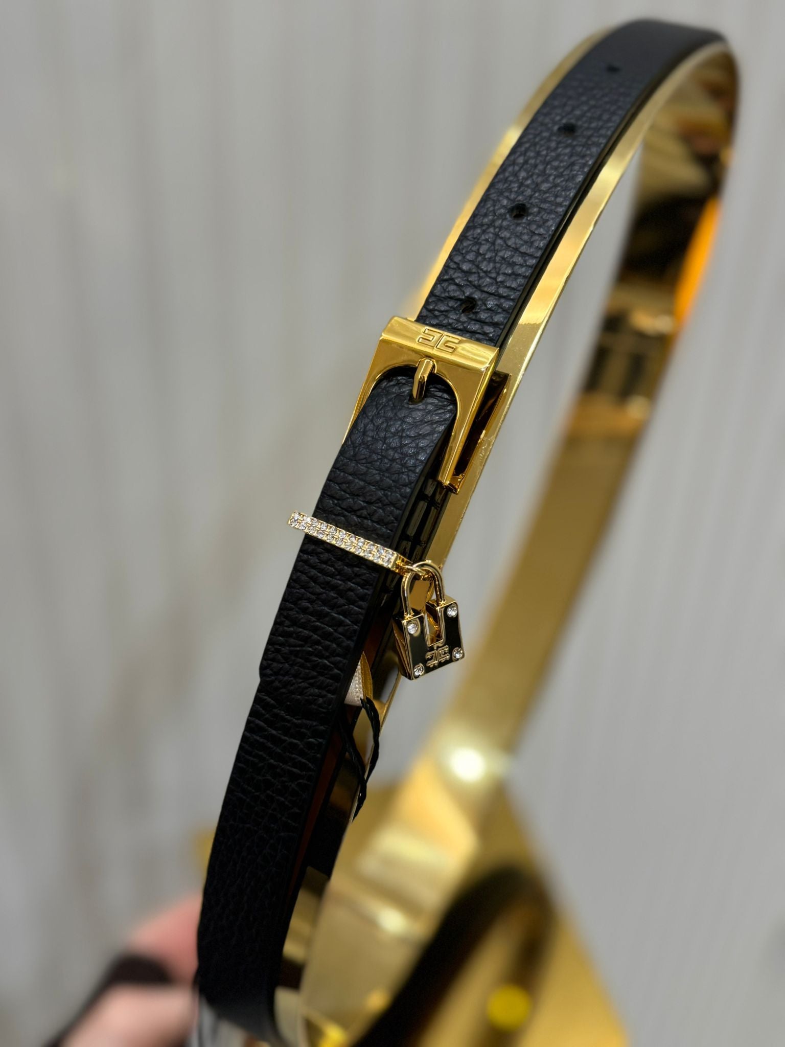 thin black belt with diamonds and keylock
