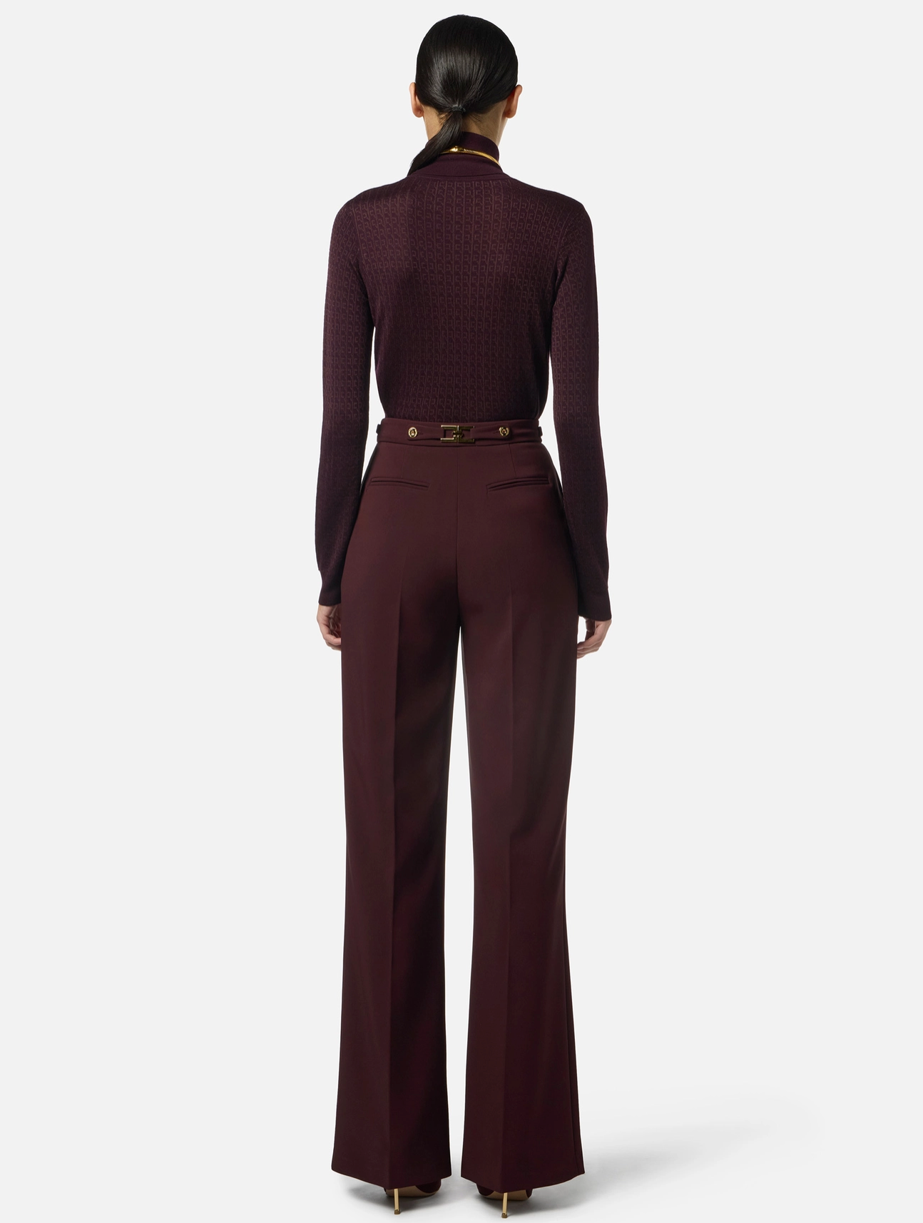 Trousers in crêpe fabric with jewel accessory