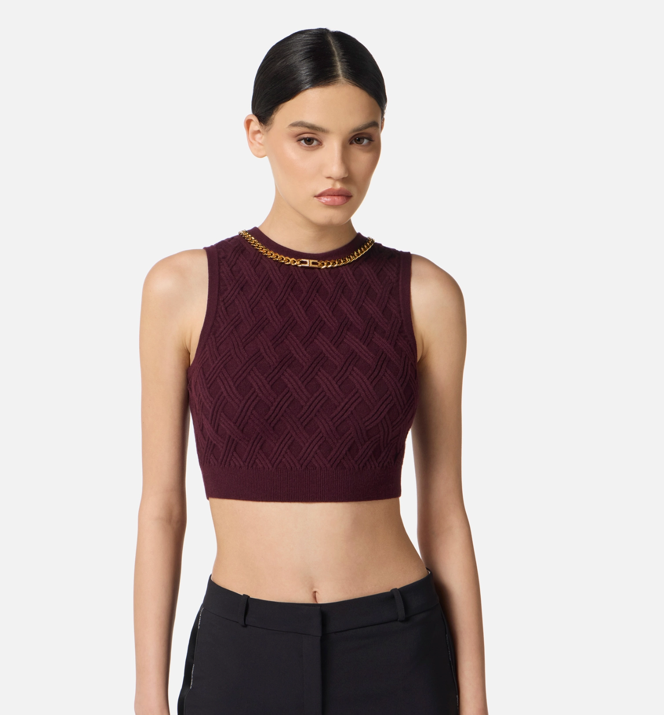 Top in knit fabric with diamond pattern and jewel details