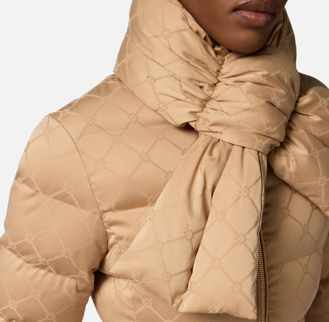Down jacket in jacquard voile fabric with belt