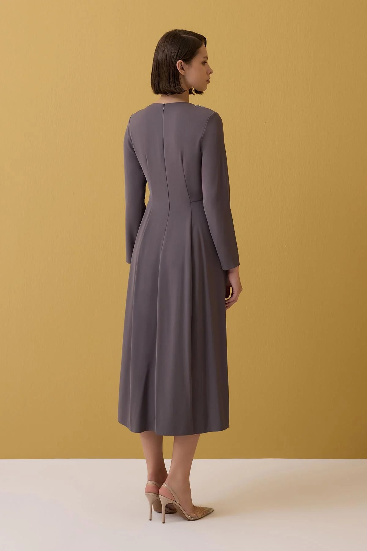 Long sleeve dress with crystals on shoulder