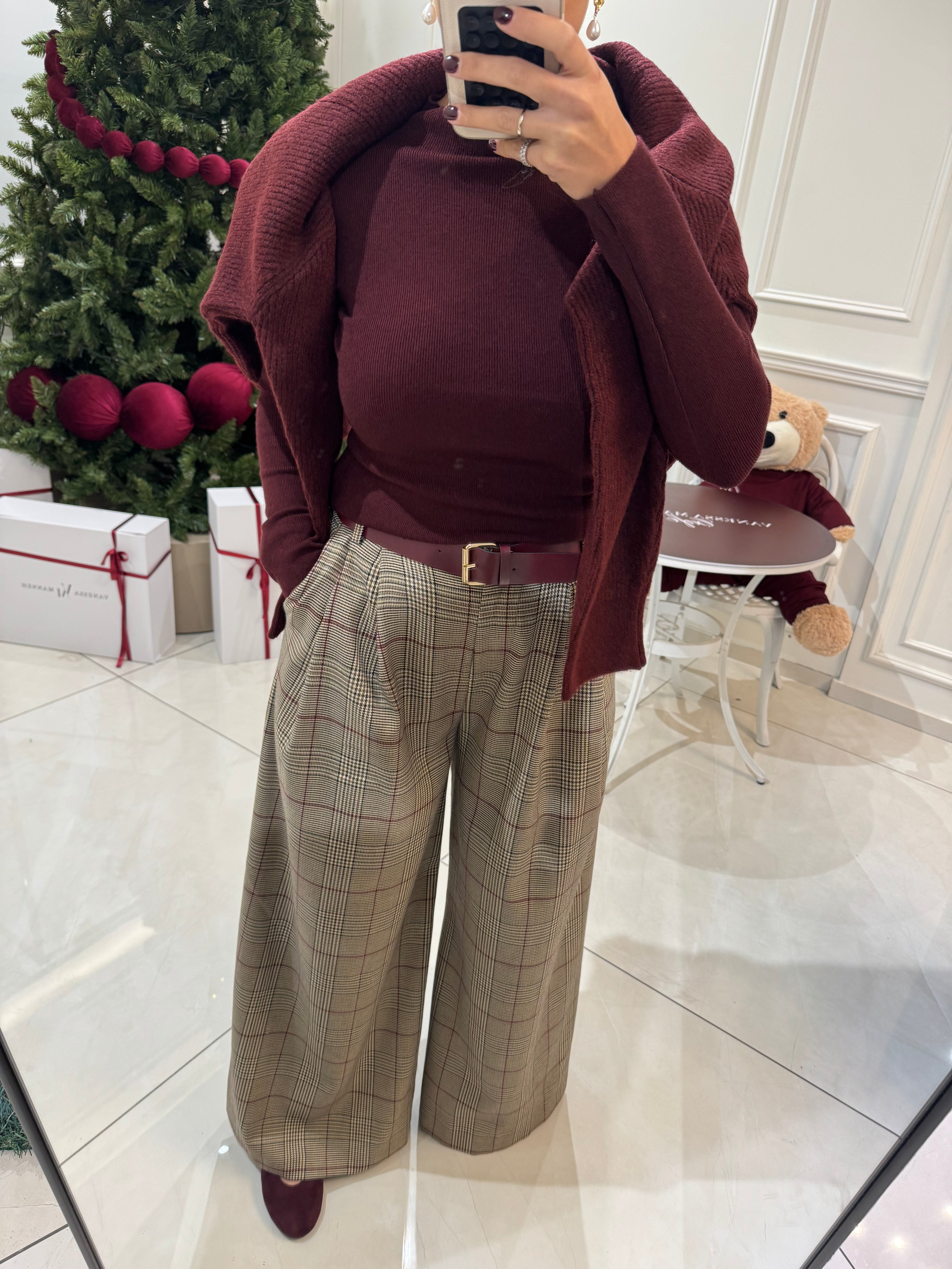 Plaid pants with a burgundy belt