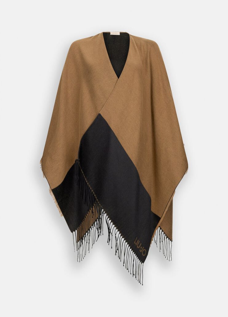 Poncho with logo and fringes