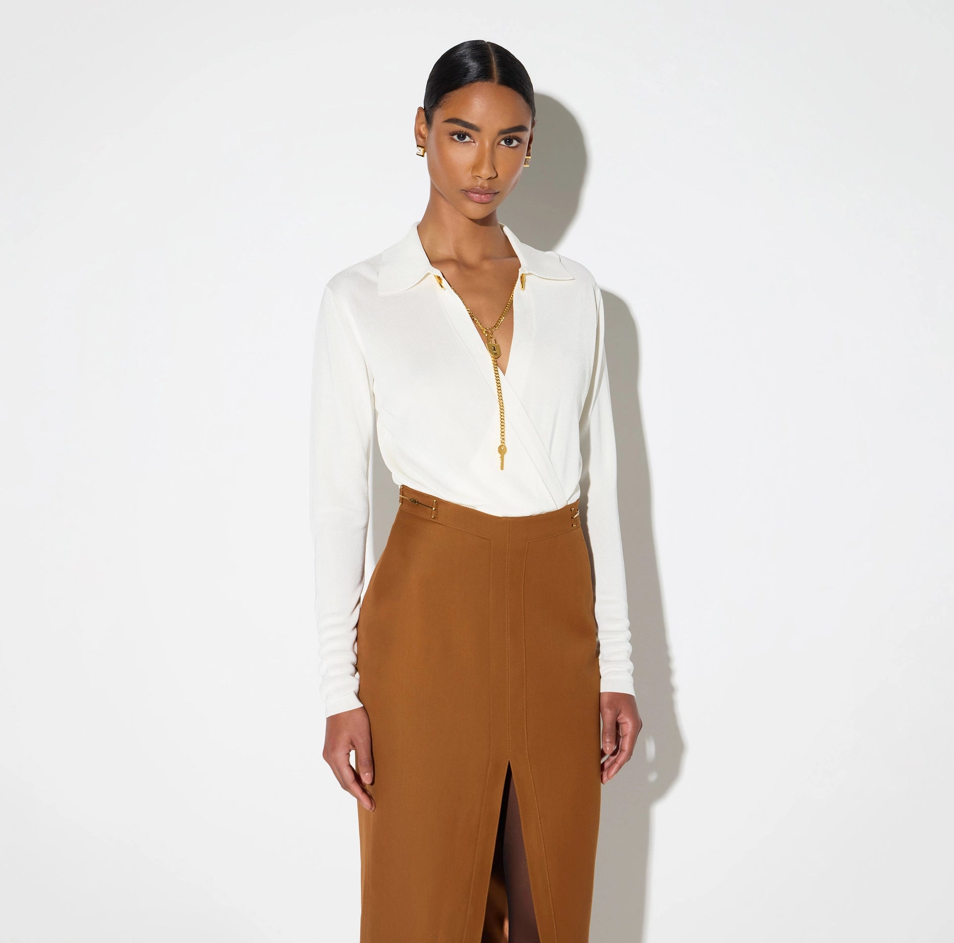 Bodysuit with jewel chain